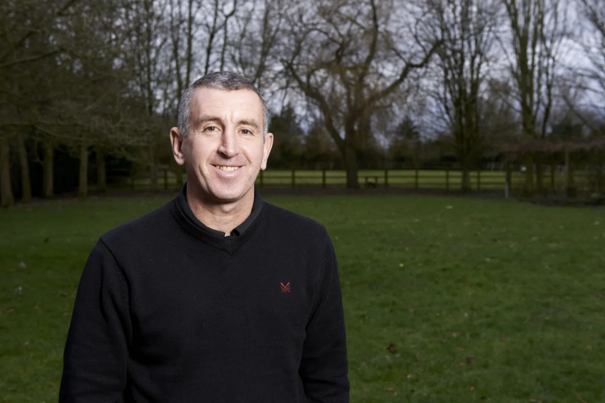 Retired Arsenal footballer Nigel Winterburn at home in his garden